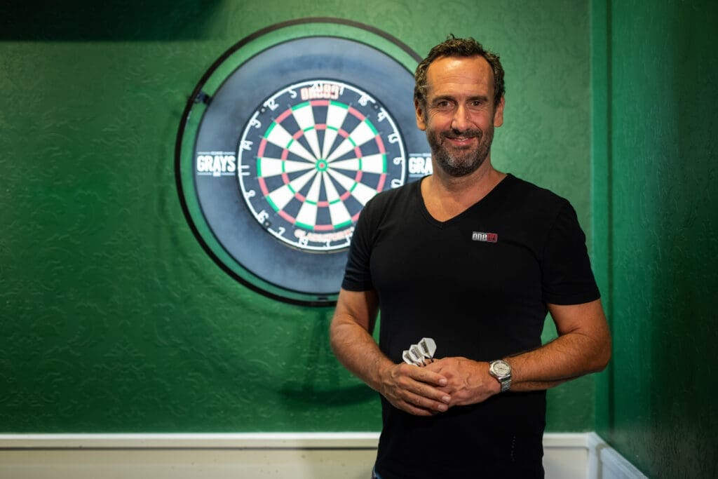 Elmar Paulke NEXT LEVEL SPEAKERS Darts Expert - Moderator, Speaker, Podcaster, and Author